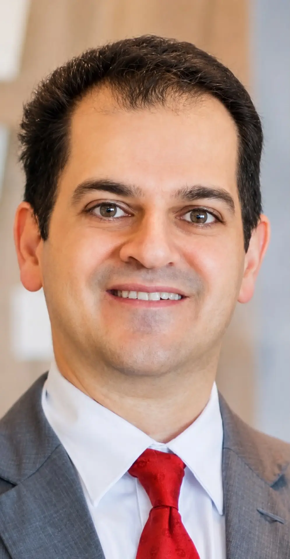 Portrait of Dr. Ahmed Al Asfoor, President of the Bahrain Association of Plastic Surgery