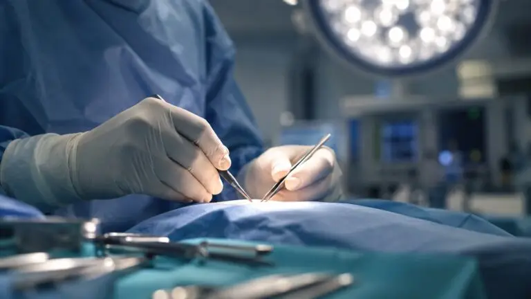 Plastic surgeons operating in a hospital theatre in Bahrain